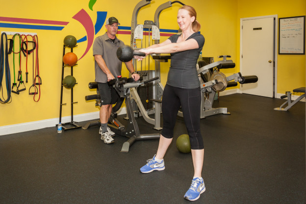 Karen at Shape Up Fitness & Wellness Consulting training with personal trainer Troy Groce